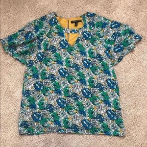 Flutter sleeve spring top